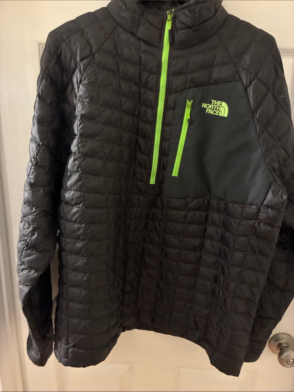 The North Face Black Pullover Puffer with Neon Lime Accents